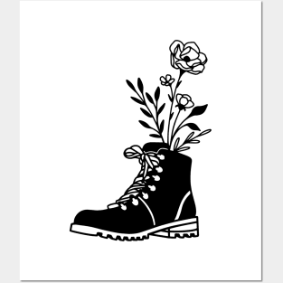 Flower growing from boots Posters and Art